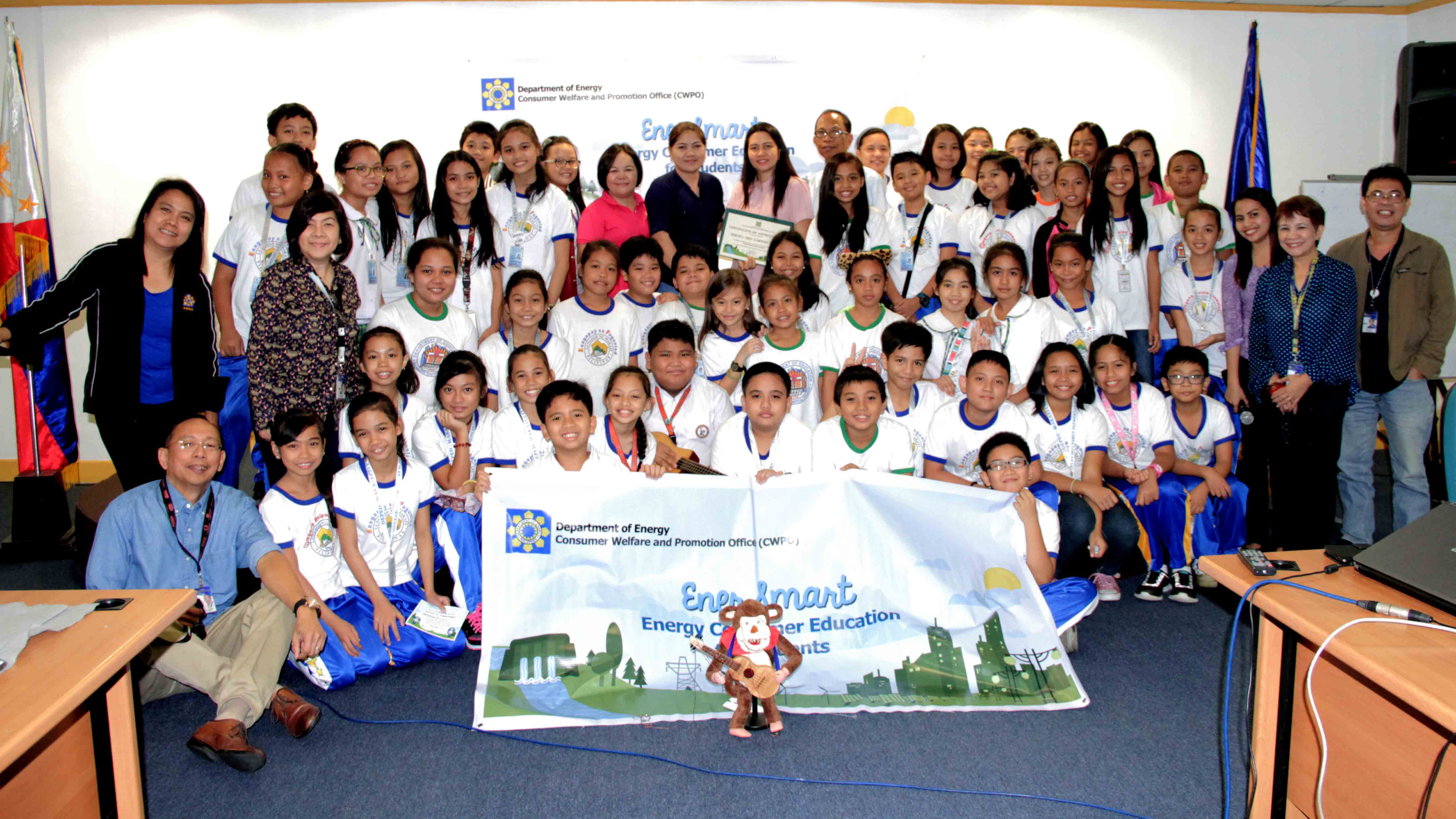 ENERSMART KIDS from Nemesio I. Yabut Elementary School together with the DOE-CWPO pose for a group photo after the Energy Briefing under the Consumer Education Program for Students.