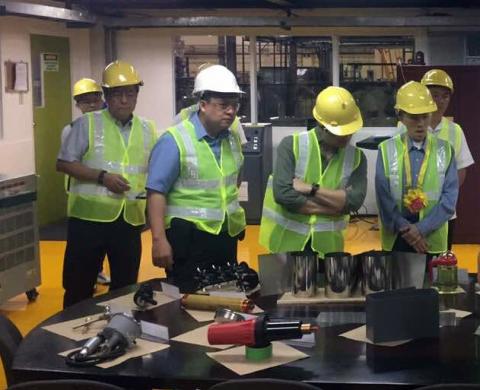 TECHNOLOGY BRIEFING: Energy Undersecretary Felix William B. Fuentebella (2nd from left), First Philec staff together with other industry participants  were briefed on the technologies being used in making a power supply transformer. First Philec inaugurated the largest amorphous transformer plant in Southeast Asia, which is located at the First Philippine Industrial Park in Tanauan City, Batangas.
