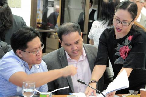 DOE Officials (L-R: Dir. Rino E. Abad, OIC Director for Oil Industry Management Bureau, Asst. Secretary Leonido J. Pulido III and Asst. Secretary Caron Aicitel E. Lascano) deliberate on some of the provisions in the proposed Philippine Natural Gas Regulation during the public consultation on 27 October 2017 at the DOE Headquarters in Taguig City.
